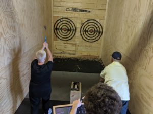 alt"innkeepers at axe throwing"